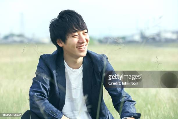 japanese portrait of a young man - japanese ethnicity bildbanksfoton och bilder