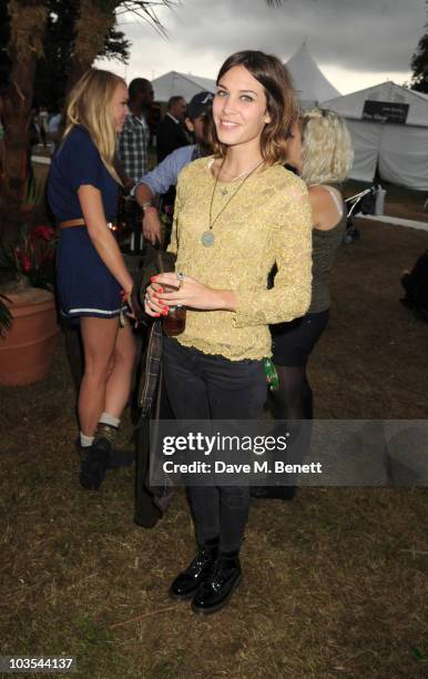 Alexa Chung poses for a photograph in the official VIP backstage area hosted by Mahiki during Day Two of V Festival 2010 on August 22, 2010 in...