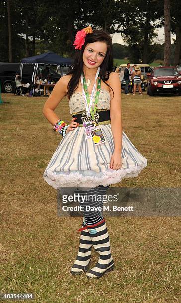 Guest poses for a photograph in the official VIP backstage area hosted by Mahiki during Day Two of V Festival 2010 on August 22, 2010 in Chelmsford,...