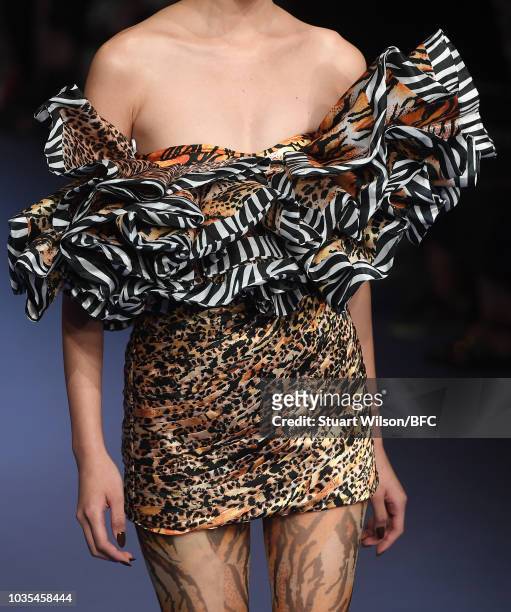 Model, detail, walks the runway at the Richard Quinn show during London Fashion Week September 2018 on September 18, 2018 in London, England.
