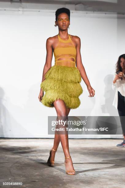 Model walks the runway at the Mark Fast DiscoveryLAB during London Fashion Week September 2018 at the BFC Designer Showrooms on September 18, 2018 in...