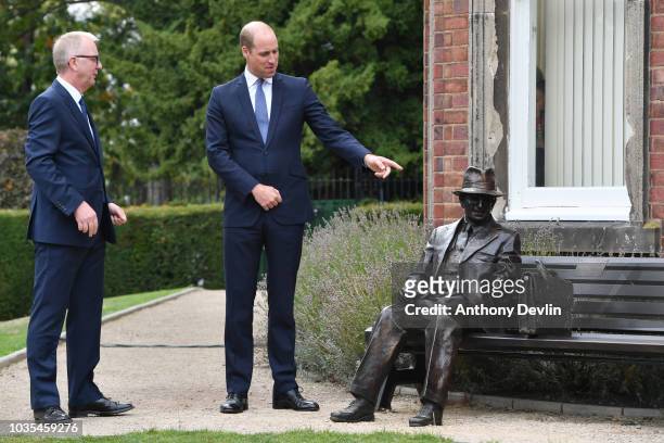 Prince William, Duke of Cambridge is joined by Ian Austin MP as he unveils a new sculpture of Major Frank Foley by artist Andy de Comyn on September...