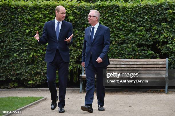 Prince William, Duke of Cambridge speaks with Ian Austin MP before unveiling a new sculpture of Major Frank Foley by artist Andy de Comyn on...