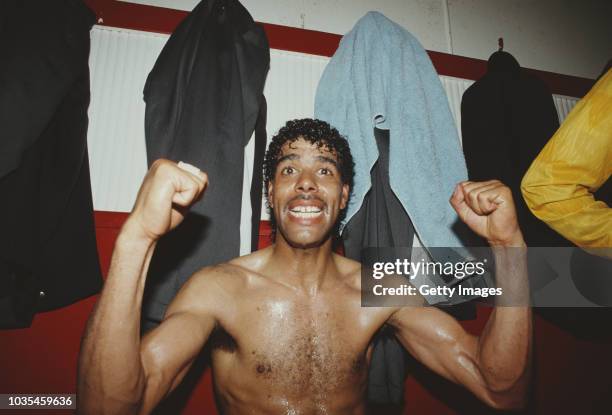 Leeds United player Chris Kamara celebrates in the dressing room after Leeds United had gained promotion to the 1st Division, after a Division two...