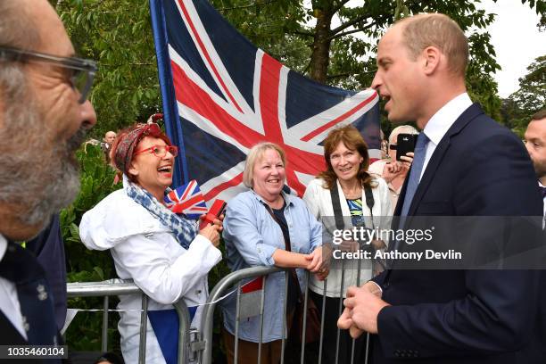 Prince William, Duke of Cambridge meets members of the public before unveiling a new sculpture of Major Frank Foley by artist Andy de Comyn on...