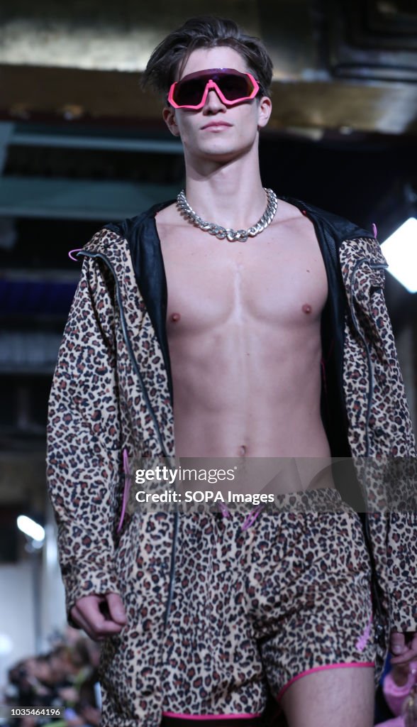 A model walks the runway at the NICOPANDA show during London...