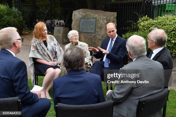 Prince William, Duke of Cambridge speaks with families of those helped by Major Frank Foley before unveiling a new sculpture of Major Foley by artist...
