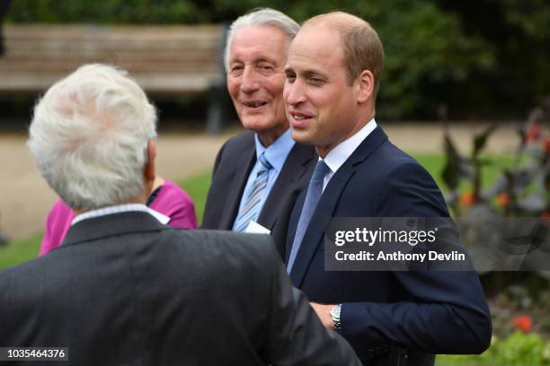 Prince William, Duke of Cambridge speaks with families of those helped by Major Frank Foley before unveiling a new sculpture of Major Foley by artist...