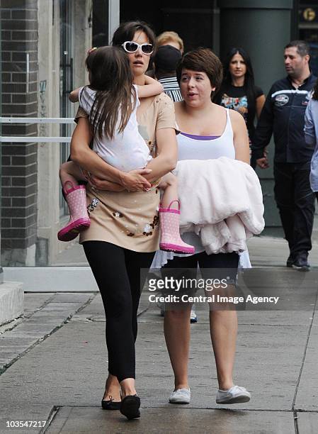 Suri Cruise, Katie Holmes and Isabella Cruise seen on the streets of Toronto on August 22, 2010 in Toronto, Ontario, Canada.