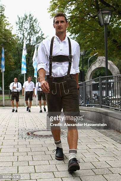Miroslav Klose of Bayern Muenchen arrives for the Paulaner photocall at the Nockerberg Biergarden on August 23, 2010 in Munich, Germany.