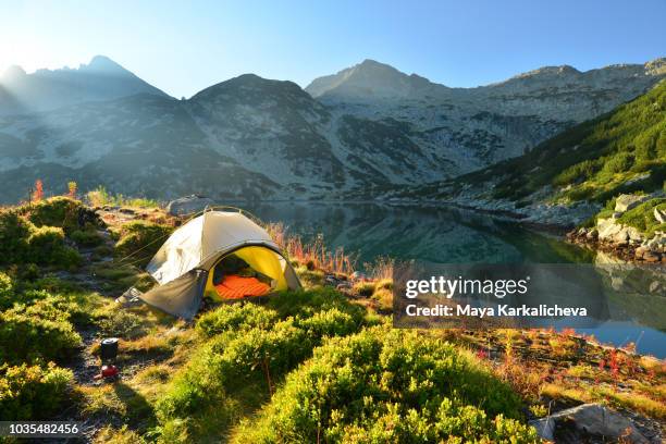 tent by a mountain lake - pirin mountains stockfoto's en -beelden