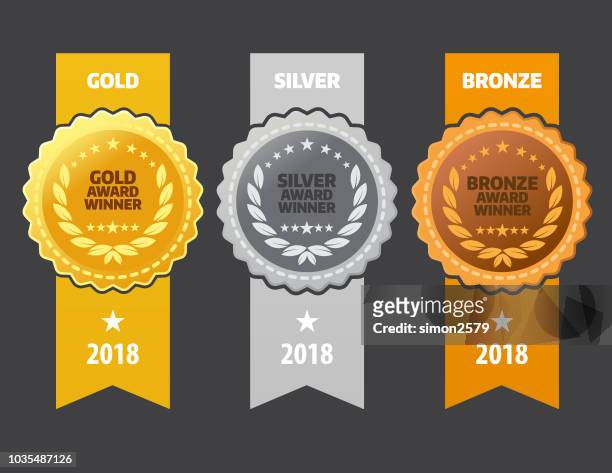 gold, silver and bronze winner medals - bronze medal stock illustrations
