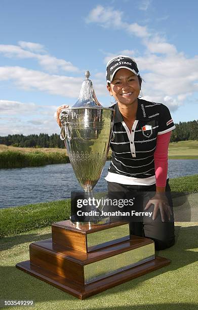 Ai Miyazato poses with the trophy after winning the Safeway Classic at Pumpkin Ridge Golf Club on August 22, 2010 in North Plains, Oregon. Miyazato...