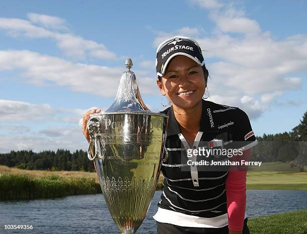 Ai Miyazato poses with the trophy after winning the Safeway Classic at Pumpkin Ridge Golf Club on August 22, 2010 in North Plains, Oregon. Miyazato...