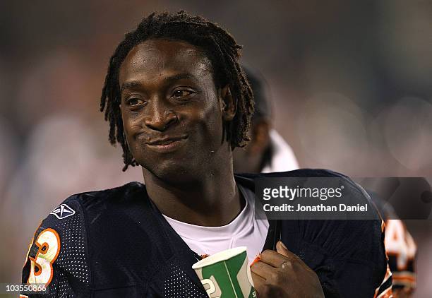 Charles Tillman of the Chicago Bears smiles on the sidelines during a preseason game against the Oakland Raiders at Soldier Field on August 21, 2010...