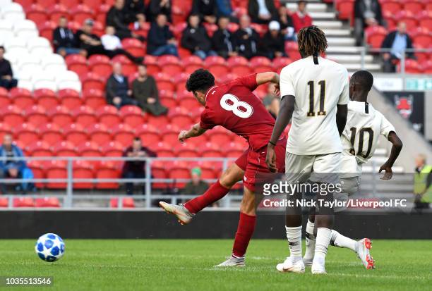 Curtis Jones of Liverpool scores during the UEFA Youth League game between Liverpool and Paris Saint-Germain at Langtree Park on September 18, 2018...
