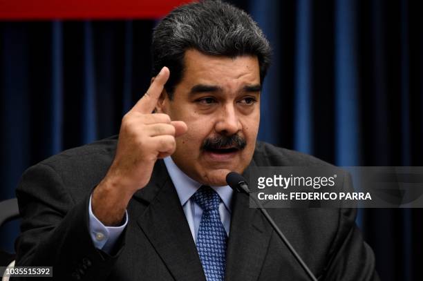 Venezuelan President Nicolas Maduro speaks during a press conference with international media correspondents following his recent trip to China, at...