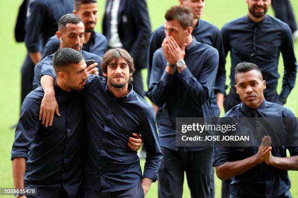 Juventus' players walk around the Mestalla stadium in Valencia, with teammates, on September 18, 2018 on the eve of the UEFA Champions League...