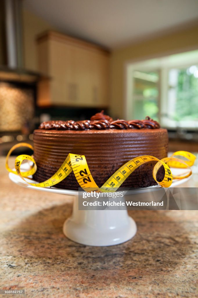 Tape Measure Wrapped Around Cake