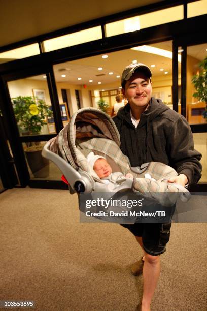 Thomas Beatie, a transgender male, leaves Saint Charles Medical Center with his new son Jensen James Beatie, the day after giving birth to him, on...