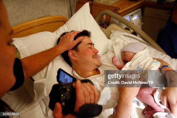 Thomas Beatie, a transgender male, gives birth to son Jensen James Beatie with his wife Nancy by his side at Saint Charles Medical Center on July 25,...