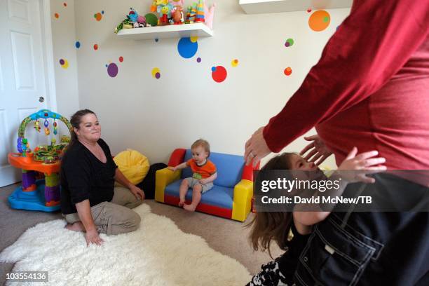 Thomas Beatie and his wife Nancy go about daily life with two-year-old daughter Susan Juliette Beatie and one-year-old son Austin Alexander Beatie...