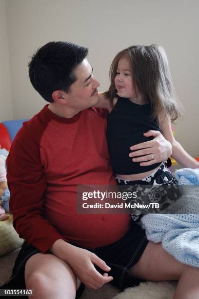 Thomas Beatie and his wife Nancy go about daily life with two-year-old daughter Susan Juliette Beatie and one-year-old son Austin Alexander Beatie...