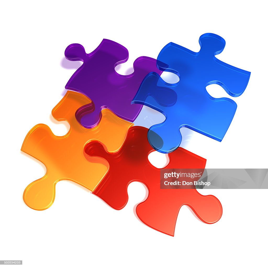 Four 3D puzzle pieces connecting