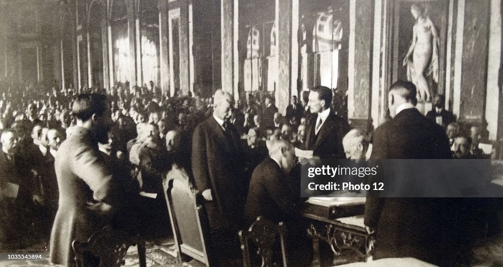Treaty of Versailles is signed by President woodrow Wilson.