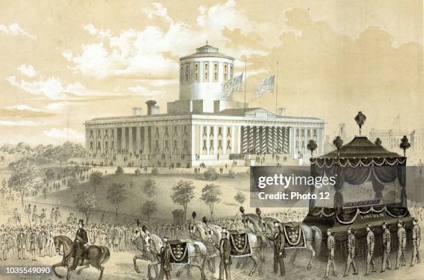 Funeral car of President Abraham Lincoln passing the State House at Columbus after his death, April 19th 1865.