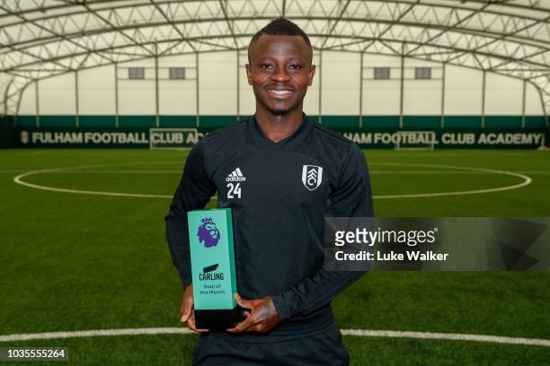 Jean Michael Seri poses with the Carling Goal of the Month Award for August 2018 at Fulham FC Training Ground on September 12, 2018 in New Malden,...