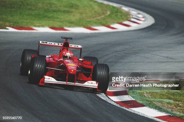 Michael Schumacher of Germany drives the Scuderia Ferrari Marlboro Ferrari F1-2000 Ferrari V10 during the Formula One Italian Grand Prix on 10...