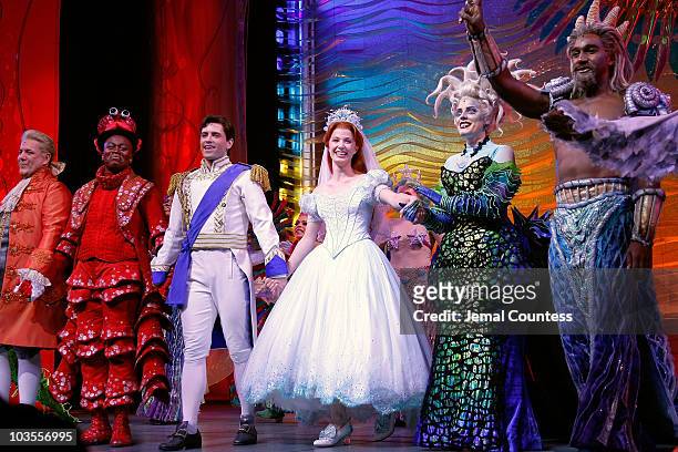 Actors Jonathan Freeman, Tituss Burgess, Sean Palmer, Sierra Boggess, Sherie Rene Scott and Norm Lewis take a bow during the curtain call at the...