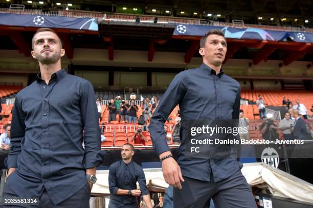 Juventus players Miralem Pjanic and Mario Mandzukic during the walk around on September 18, 2018 in Valencia, Spain.