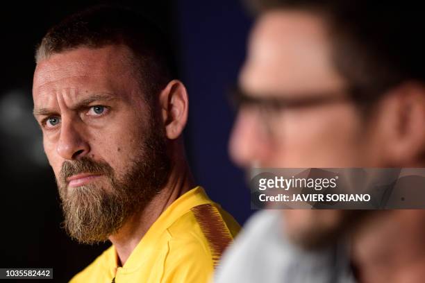 Roma's Italian midfielder Daniele De Rossi holds a press conference at the Santiago Bernabeu stadium in Madrid on September 18, 2018 on the eve of...
