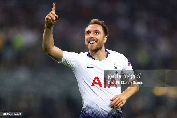 Christian Eriksen of Tottenham Hotspur celebrates after scoring his team's first goal during the Group B match of the UEFA Champions League between...