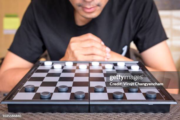 Black Checkers Photos and Premium High Res Pictures - Getty Images