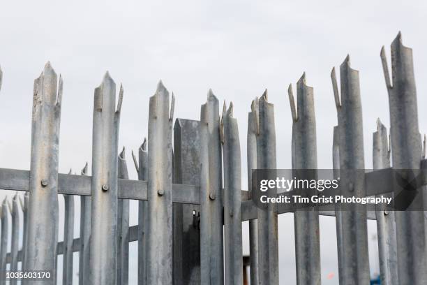 metal palisade security fence - palisades pictures stock pictures, royalty-free photos & images