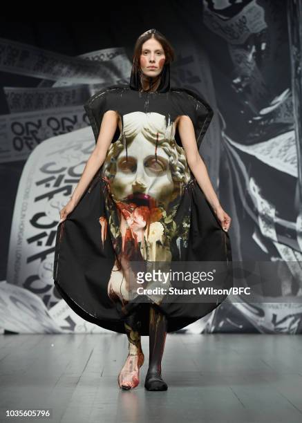 Model walks the runway at the On|Off show during London Fashion Week September 2018 at the BFC Show Space on September 18, 2018 in London, England.