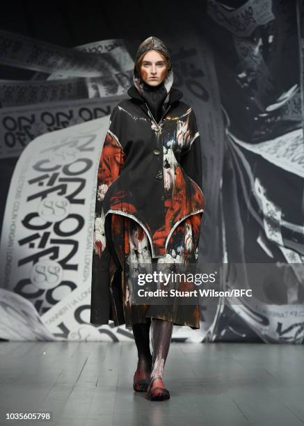 Model walks the runway at the On|Off show during London Fashion Week September 2018 at the BFC Show Space on September 18, 2018 in London, England.