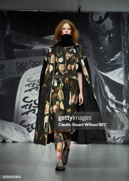 Model walks the runway at the On|Off show during London Fashion Week September 2018 at the BFC Show Space on September 18, 2018 in London, England.