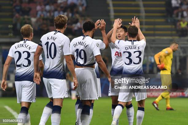 Tottenham's Danish midfielder Christian Eriksen, Tottenham's English forward Harry Kane, Tottenham's Belgian midfielder Moussa Dembele, Tottenham's...