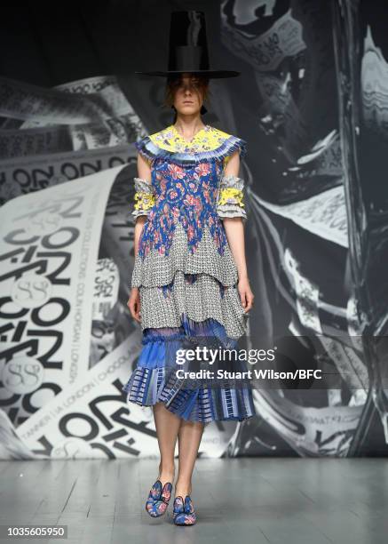 Model walks the runway at the On|Off show during London Fashion Week September 2018 at the BFC Show Space on September 18, 2018 in London, England.