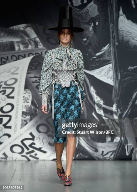 Model walks the runway at the On|Off show during London Fashion Week September 2018 at the BFC Show Space on September 18, 2018 in London, England.