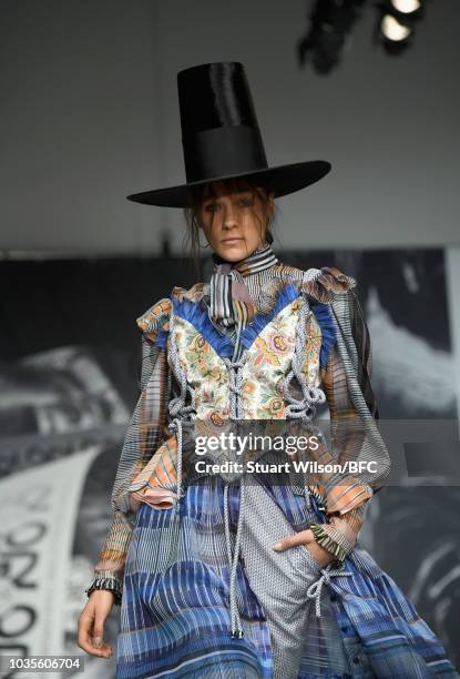 Model walks the runway at the On|Off show during London Fashion Week September 2018 at the BFC Show Space on September 18, 2018 in London, England.