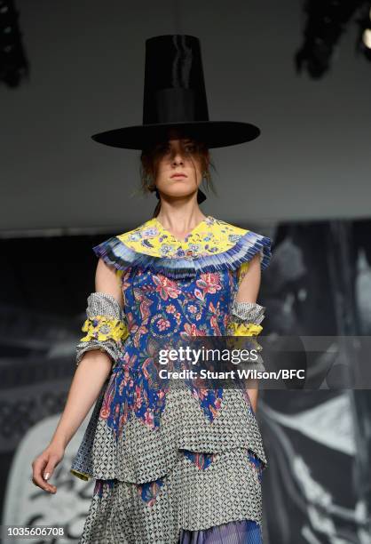 Model walks the runway at the On|Off show during London Fashion Week September 2018 at the BFC Show Space on September 18, 2018 in London, England.