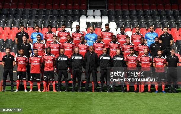 French L1 football club Guingamp's players and staff pose for the official photograph at the Roudourou stadium in Guingamp, western France, on...