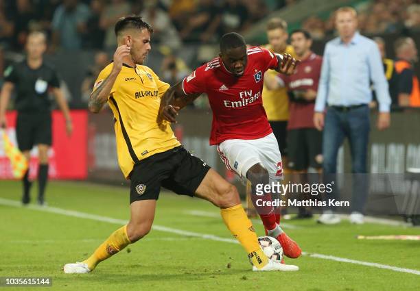 Dario Dumic of Dresden battles for the ball with Eliaquim Mangala of Hamburg during the Second Bundesliga match between SG Dynamo Dresden and...