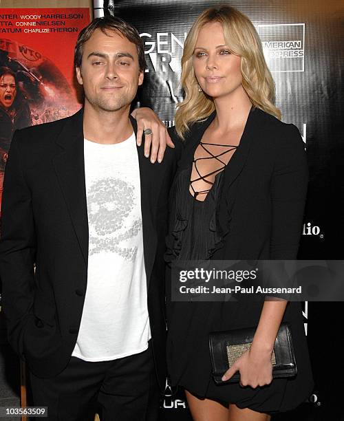 Writer/director Stuart Townsend and actress Charlize Theron arrive at a special screening of "Battle in Seattle" held at the Clarity Theater on...