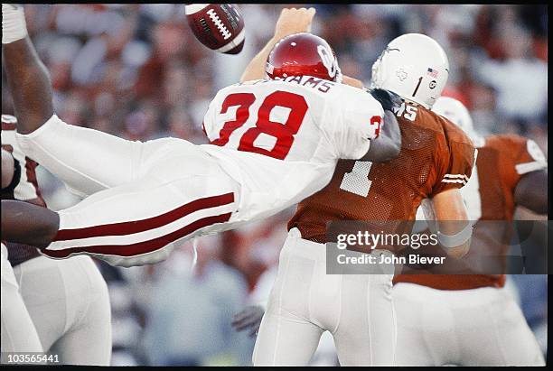 Oklahoma Roy Williams in action, defense vs Texas QB Chris Simms in the end zone. Simms threw an interception which was returned for a touchdown by...